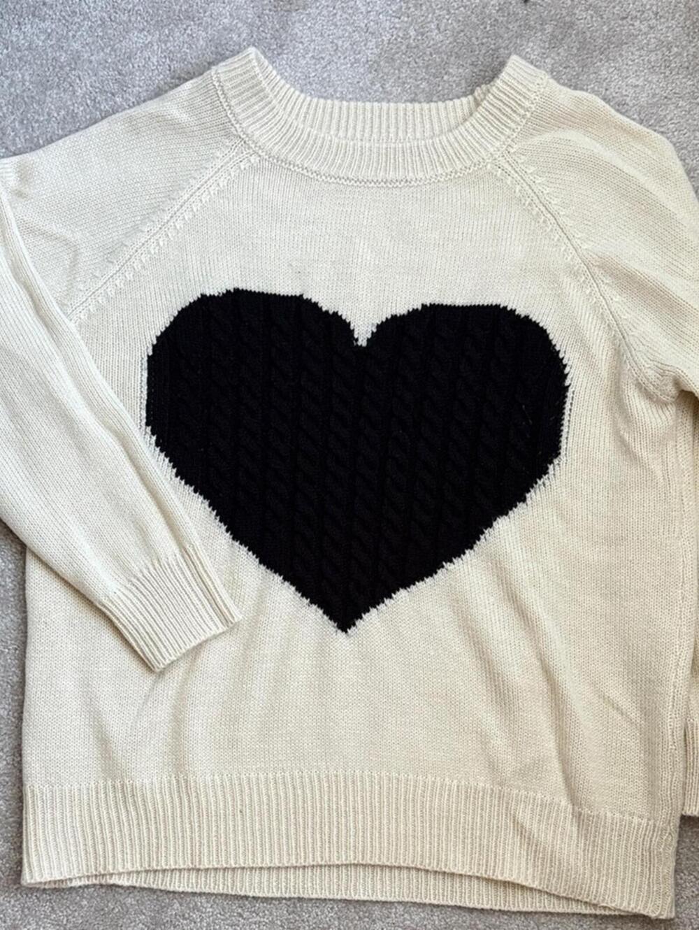 Cozy Cream Sweater with Black Heart Design